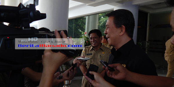 Gubernur Sulut Dr S H Sarundajang bersama Sekprov Sulut Ir S R Mokodongan