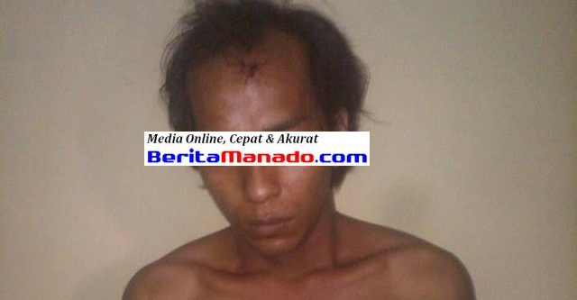 Tersangka FK alias Budi, pelaku pemerkosaan saat ditahan di ruang SPKT Polresta Manado 
