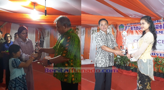 Bupati Vonnie Panambunan dan Ketua DPRD Minut Berty Kapojos membagikan hadiah kepada pemenang lomba.
