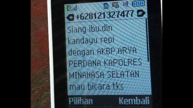 SMS Yang Mencatut Nama Kapolres Minsel