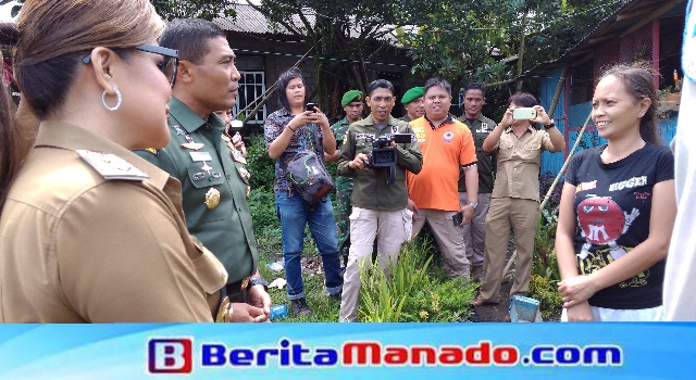 Brigjen TNI Robert Joseph Giri bersama Wakil Walikota Tomohon Syerly Adeline Sompotan saat berkunjung ke salah satu warga kaki Gunung Lokon