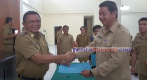 ARNOLUS WOLAJAN Jabat Plt Sekda Minut