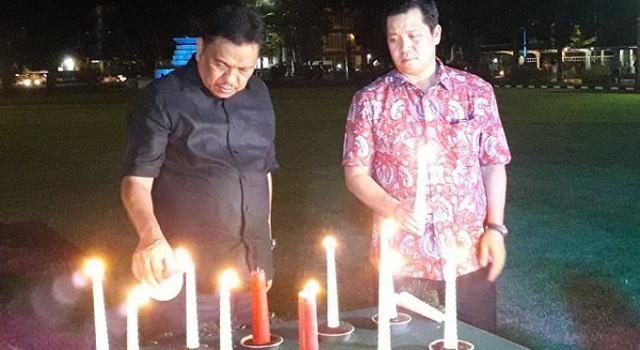 Pemprov Sulut Doakan Korban Bencana Palu dan Banten-Lampung dengan Pasang Lilin di Pisah Tahun