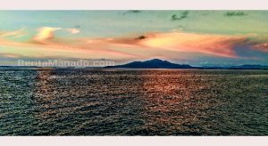 Matahari Terbenam di Pantai Manado Aset Pariwisata Meyakinkan