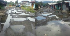 Kubangan Air Hiasi Kawasan Wisata Kuliner Bitung Usai Hujan