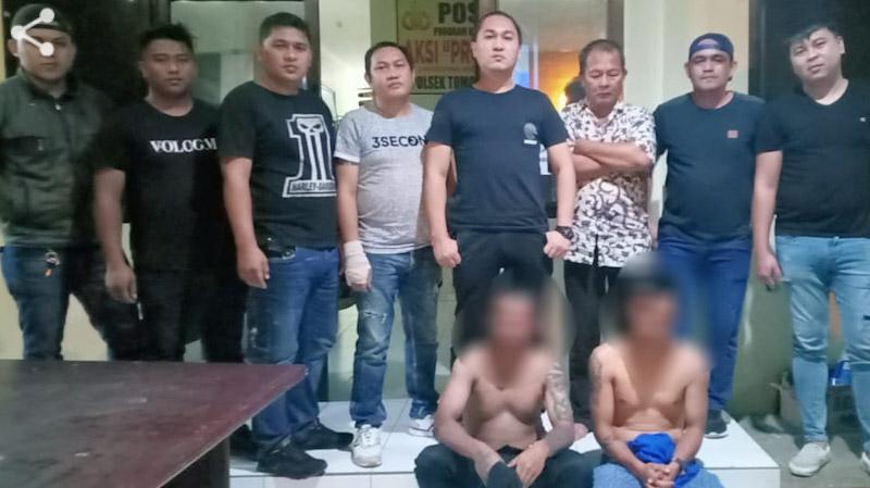 Kakak Beradik Terduga Penganiaya Diamankan di Polsek Tomohon Selatan