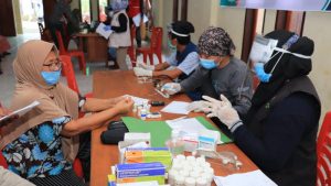 Dinkes Bolmut Bantu Korban Banjir Bolsel