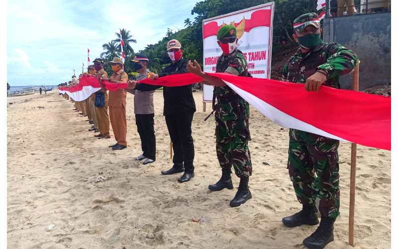 Bendera Merah Putih Sepanjang 545 meter Dibentangkan di Perbatasan Indonesia-Filipina