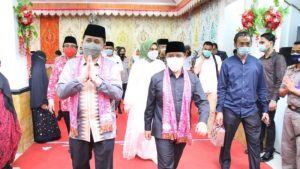 Pjs Gubernur Agus Fatoni Sosialisasikan Gerakan Sulut Bermasker pada Peringatan Maulid Nabi Muhammad di Kotamobagu