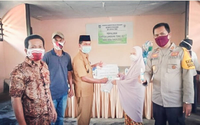 141 Warga Desa Passi Terima BLT, Masker, dan Hand Sanitizer