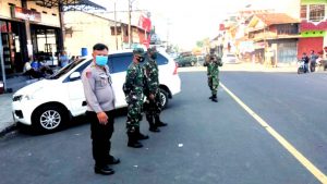 Lakukan Patroli Gabungan, Polsek Kawangkoan dan Koramil Ajak Patuhi 3M
