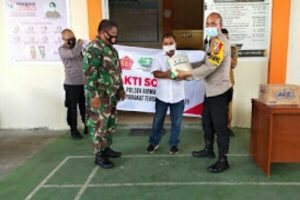 Polsek Airmadidi Bakti Sosial untuk Warga Terdampak Covid-19