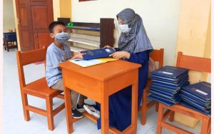 Penerimaan Rapor SDIT An-Nahl Terapkan Protokol Kesehatan