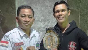 KONI Minut Dukung Capaian Prestasi Billy Pasulatan di MMA