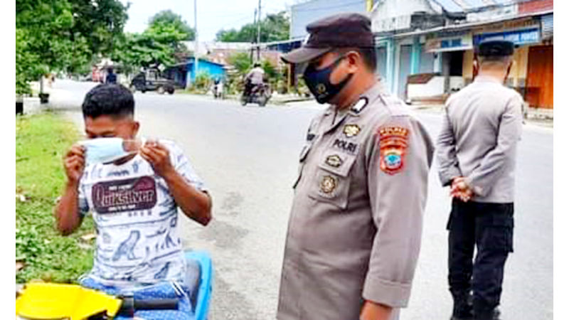 Pakai Masker Didagu, Warga Dicegat Polisi