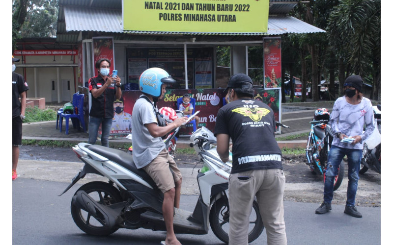 HSC Minahasa Utara Rayakan Ulang Tahun dengan Berbagi Masker di Zero Point