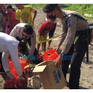 Heboh… Plastik Merah Mengapung di Pantai Malalayang, Ternyata Isinya?