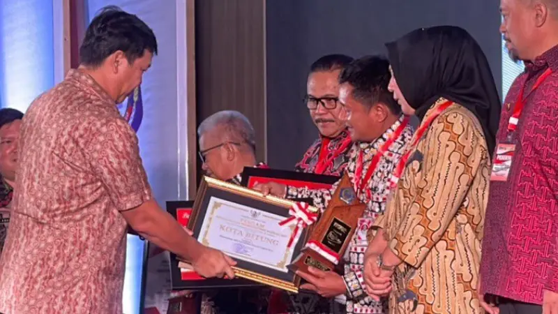 Helm Merah dan Kuning Hantarkan Bitung Kota Terbaik se-Sulut