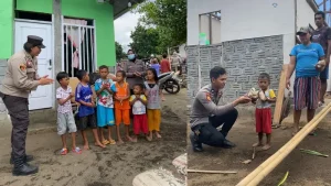 Ajak Anak-anak Bernyanyi dan Bagikan Makanan Dilakukan Kanit PPA di Lahan Eks HGU Girian Indah