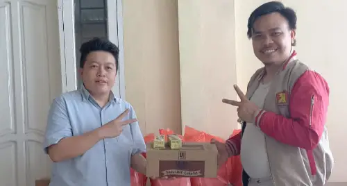 Berita Foto: Kebersamaan TKD Prabowo-Gibran Sulut Bagi Makanan dan Susu Gratis ke Ribuan Warga