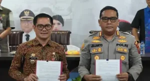 Joune Ganda Teken NPHD dengan Polresta Manado, Siap Wujudkan Pilkada Damai di Minut