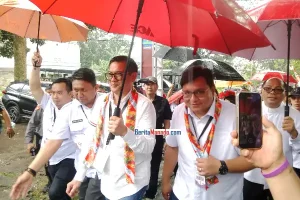 Hujan Berkat Sambut Joune Ganda – Kevin Lotulung di KPU Minut