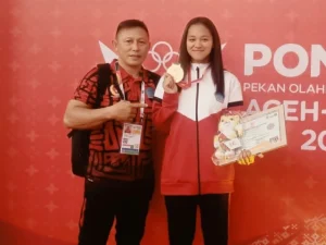 Regina Inggar Kickboxer Perempuan Asal Sulut Raih Medali Emas PON 2024