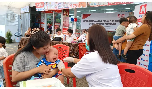 Alfamidi Ajak Orang Tua Makin Peduli Tingkatkan Gizi Anak di Tomohon
