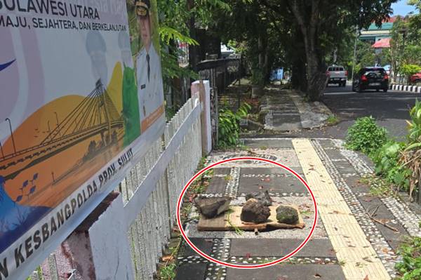Gerak Cepat Kaban Kesbangpol Sulut Johnny Suak Atasi Lubang Berbahaya di Depan Kantor