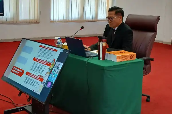 Joune Ganda Tampil Smart dengan Disertasi Bimindo GANDA