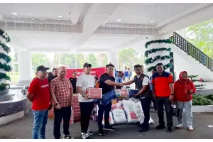 Telkomsel Salurkan Bantuan Logistik untuk Korban Banjir Bandang di Siau