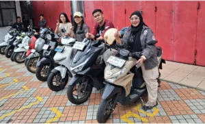 Simak Tips Cari Aman saat Touring dengan Skutik Honda