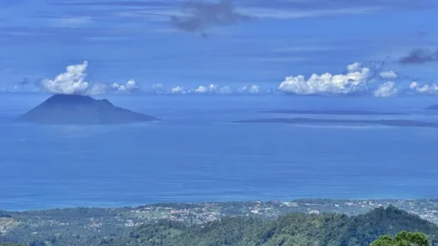 Pemandangan Pulau Manado Tua dan Bunaken dari puncak Agotey, Minahasa, Sulawesi Utara.