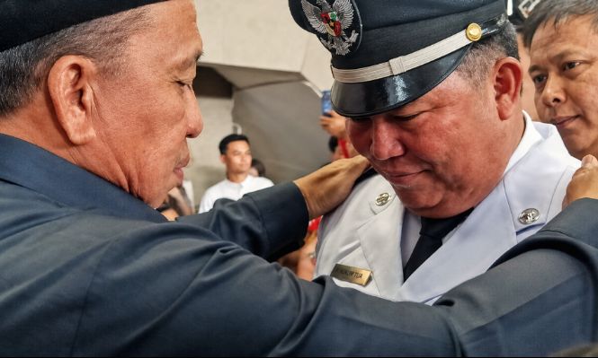 Dengan Wajah Tertunduk, Audy Wungkar Sah Dilantik Sebagai Hukum Tua Desa Wolaang