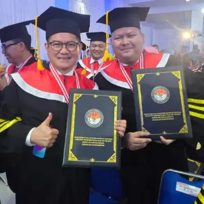 Putra Minahasa Utara Zefanya Jocom Raih Gelar Doktor Bersama Bupati Joune Ganda, Jadi Inspirasi Generasi Muda