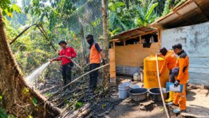 Karhutla Mengancam Batuputih, BPBD Bitung Kerahkan Tim Gabungan Padamkan Api dan Salurkan Air Bersih