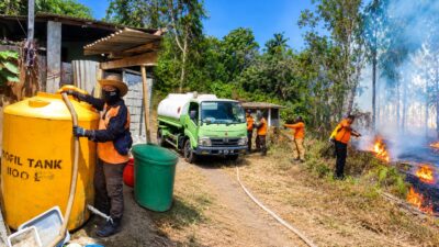 Kekeringan dan Karhutla Melanda Bitung, BPBD Salurkan 101.400 Liter Air Bersih ke Warga