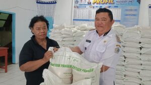 Bantuan Pangan Disalurkan, 472 Warga Madidir Unet Terima 14,16 Ton Beras