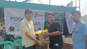 Ringankan Beban Korban Kebakaran Pateten Satu, Sahabat Nelayan Bitung Salurkan Bantuan Kemanusiaan