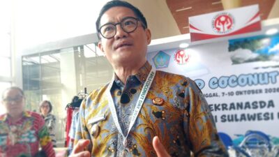 Bupati Minahasa Utara Joune Ganda dalam kegiatan pembangunan dan pelayanan masyarakat Oktober 2026.